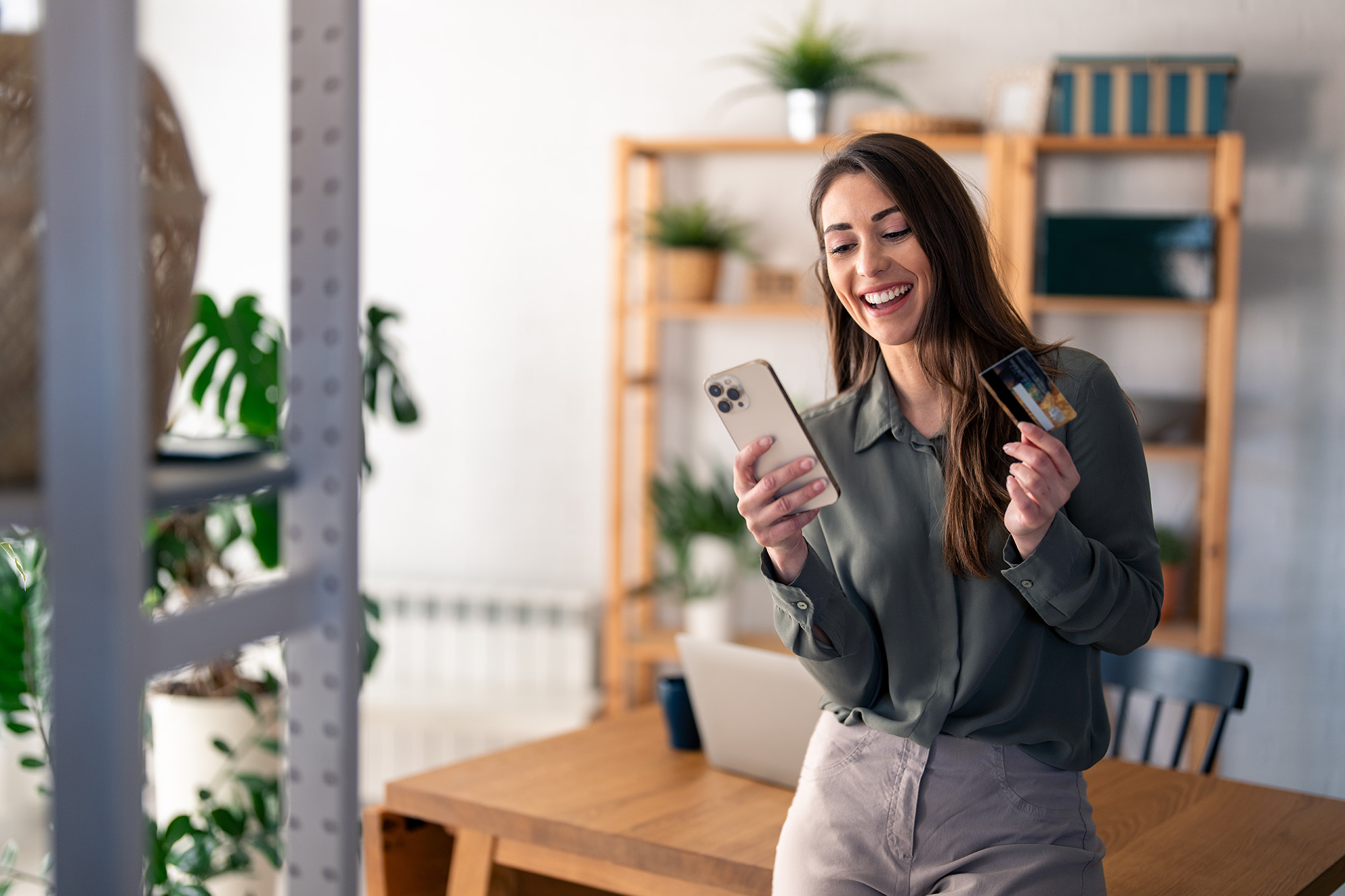 A woman shopping on her phone.